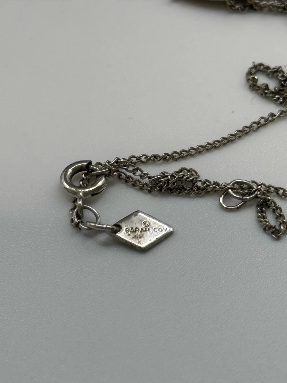 Vintage Sarah Coventry silver toned pear shaped pendant necklace